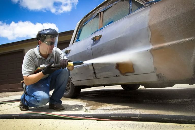 Paint and rust removal from classic car using mobile sandblasting in Omaha NE